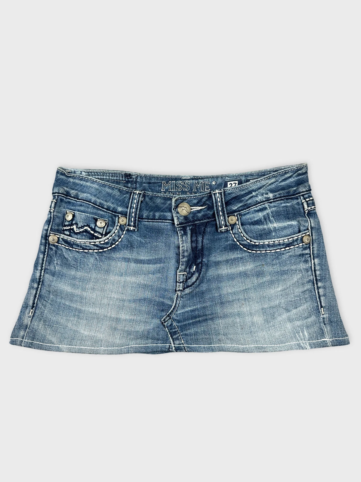 Front view of a denim skirt in light blue with stitching details.