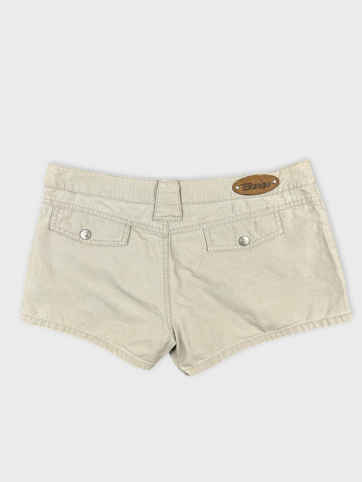 Back view of light beige denim shorts featuring two back pockets.