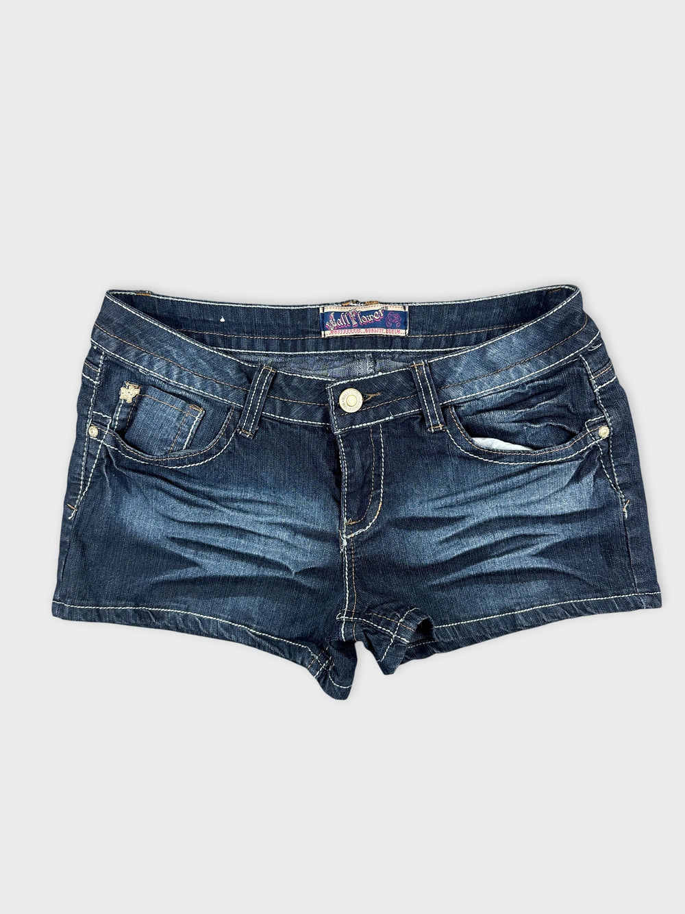 Front view of dark blue denim shorts with visible stitching details