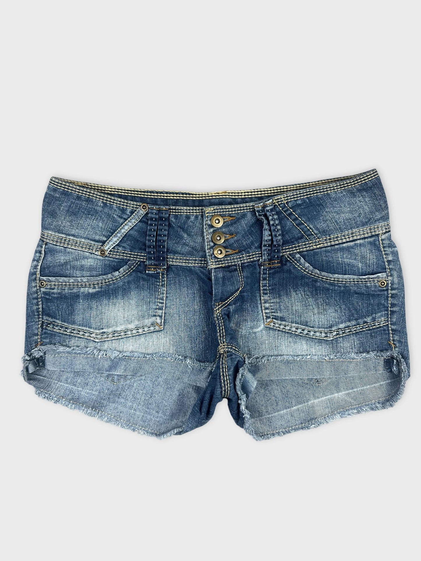 Front view of blue denim shorts featuring distressed hem and button details.