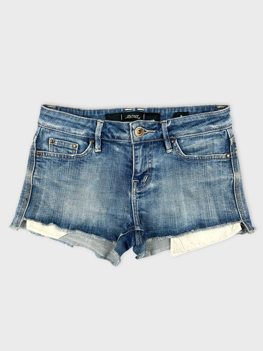 Front view of blue denim shorts featuring frayed hem detailing.