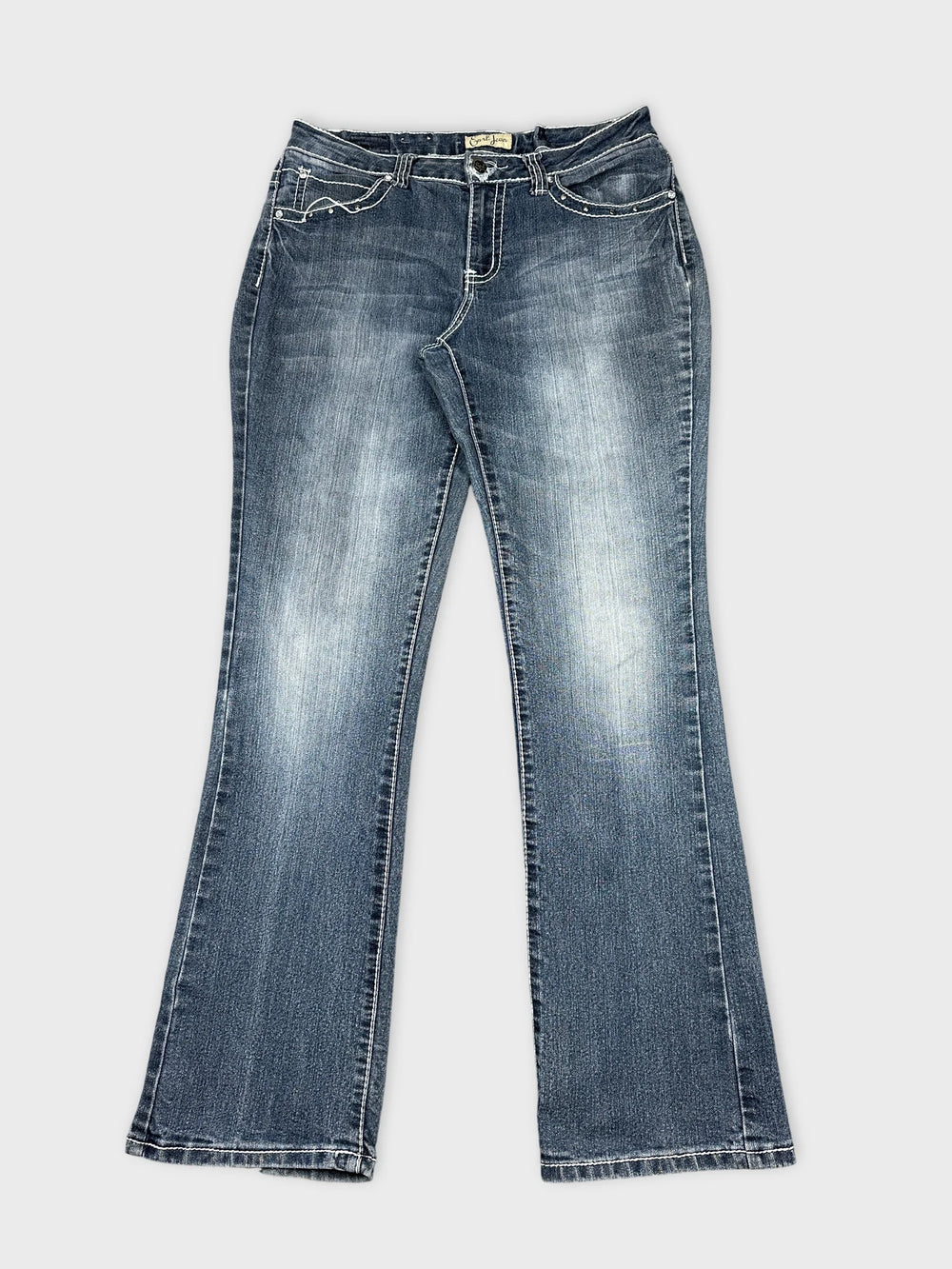 Front view of long jeans in dark blue with a faded finish.