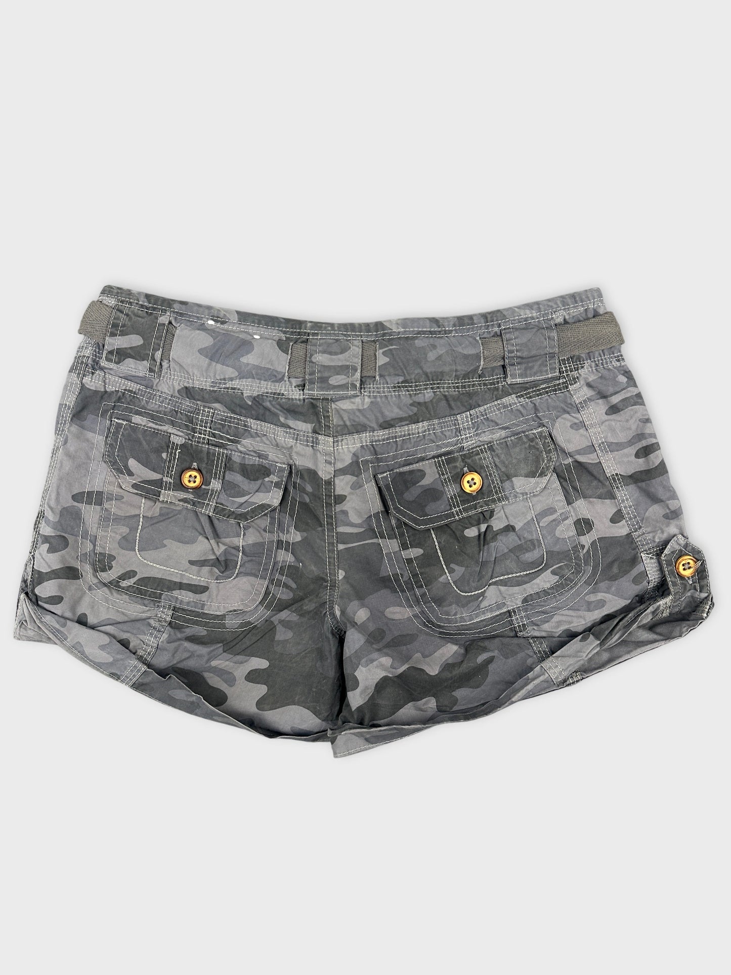 Back view of women's gray camo shorts with buttoned pocket details.