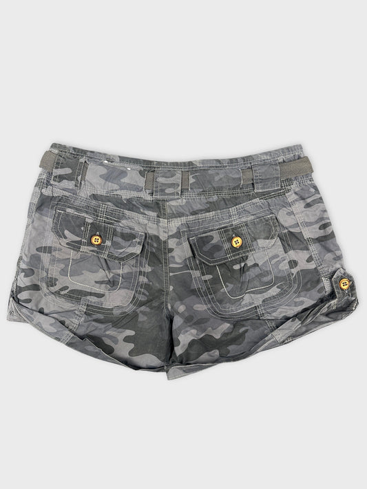 Back view of women's gray camo shorts with buttoned pocket details.