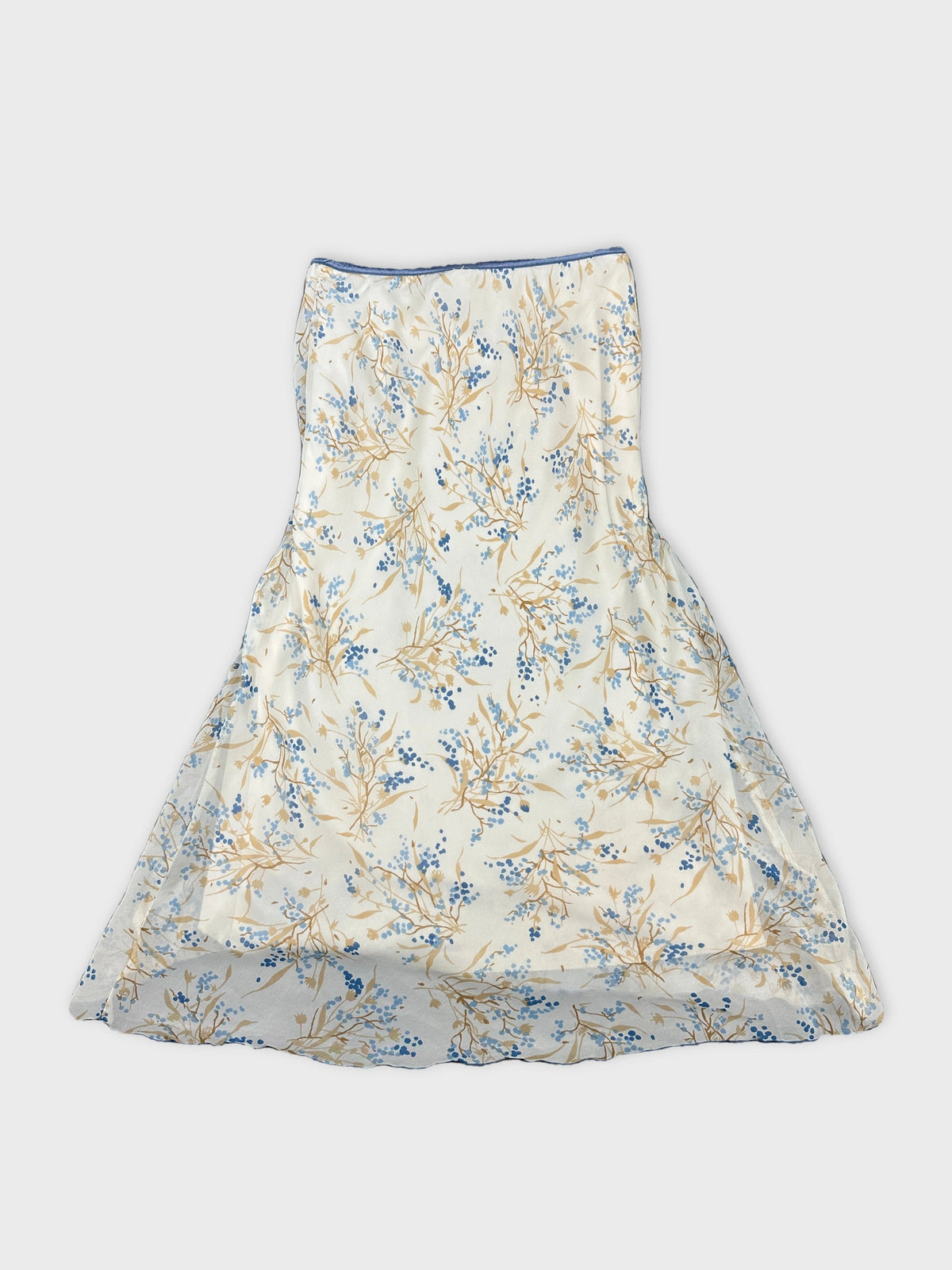 Back view of a floral print skirt in cream and blue.