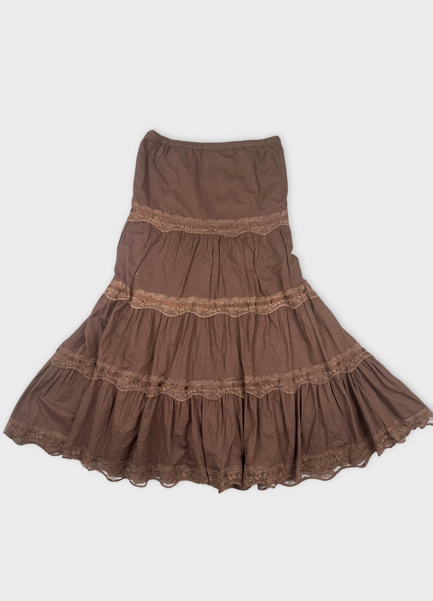 Brown tiered skirt with lace trim back view.