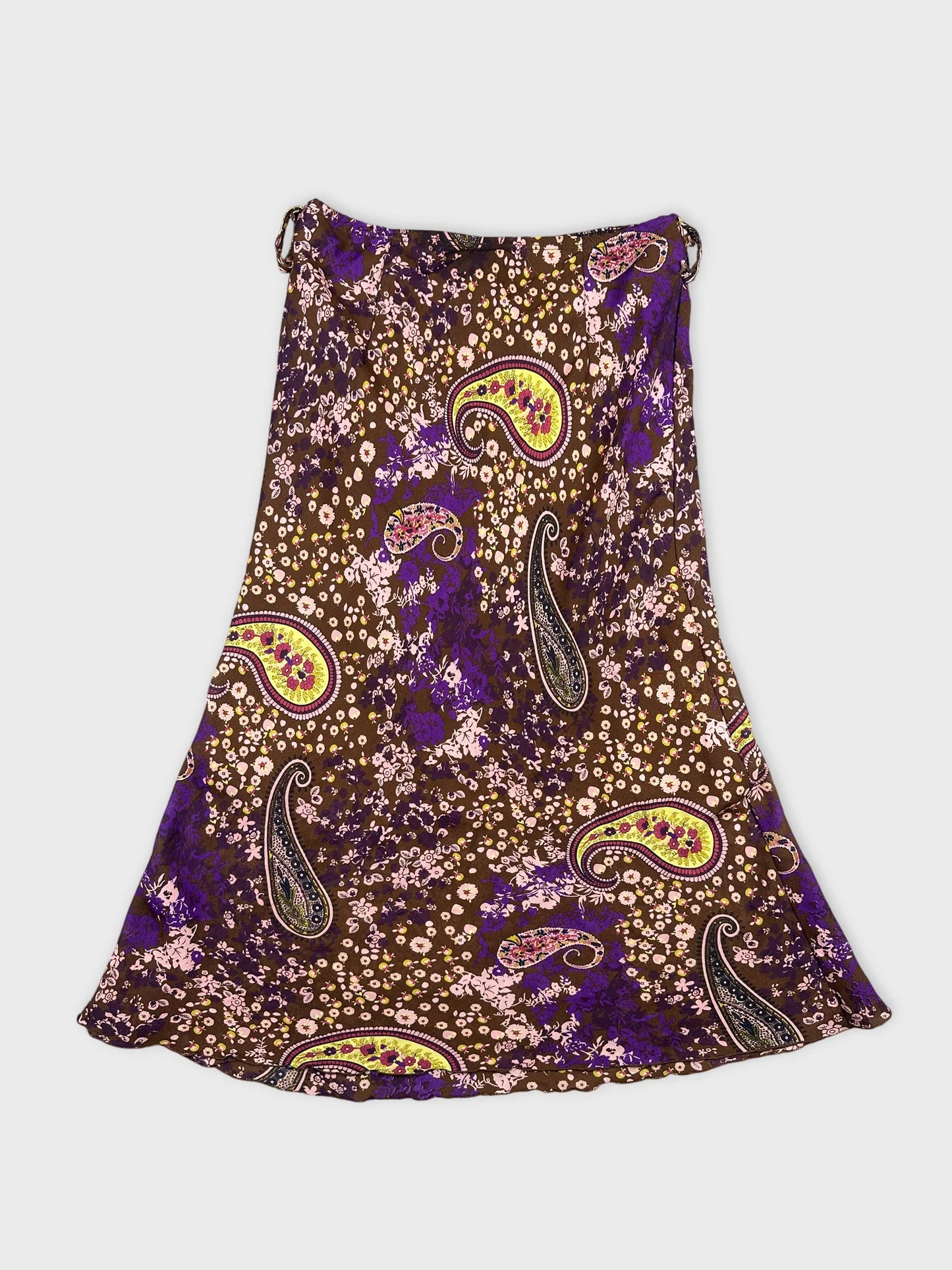 Back view of a brown skirt with paisley and floral patterns