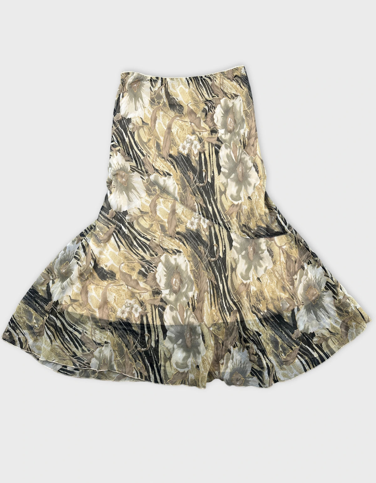 Detail view of a vintage floral print skirt in beige and black.
