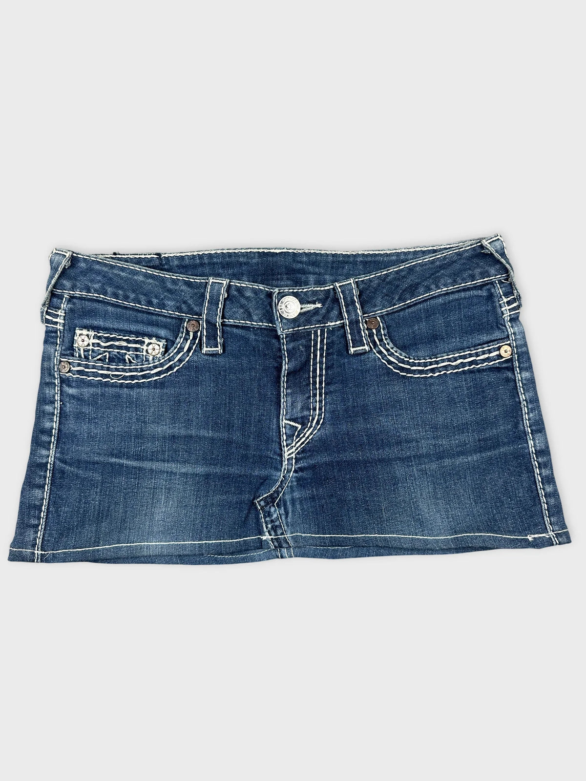 Front view of a denim mini skirt with white stitching details.