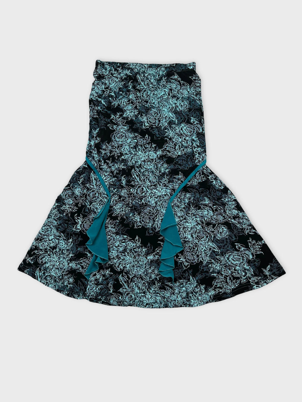 Front view of a black floral skirt with frill details.