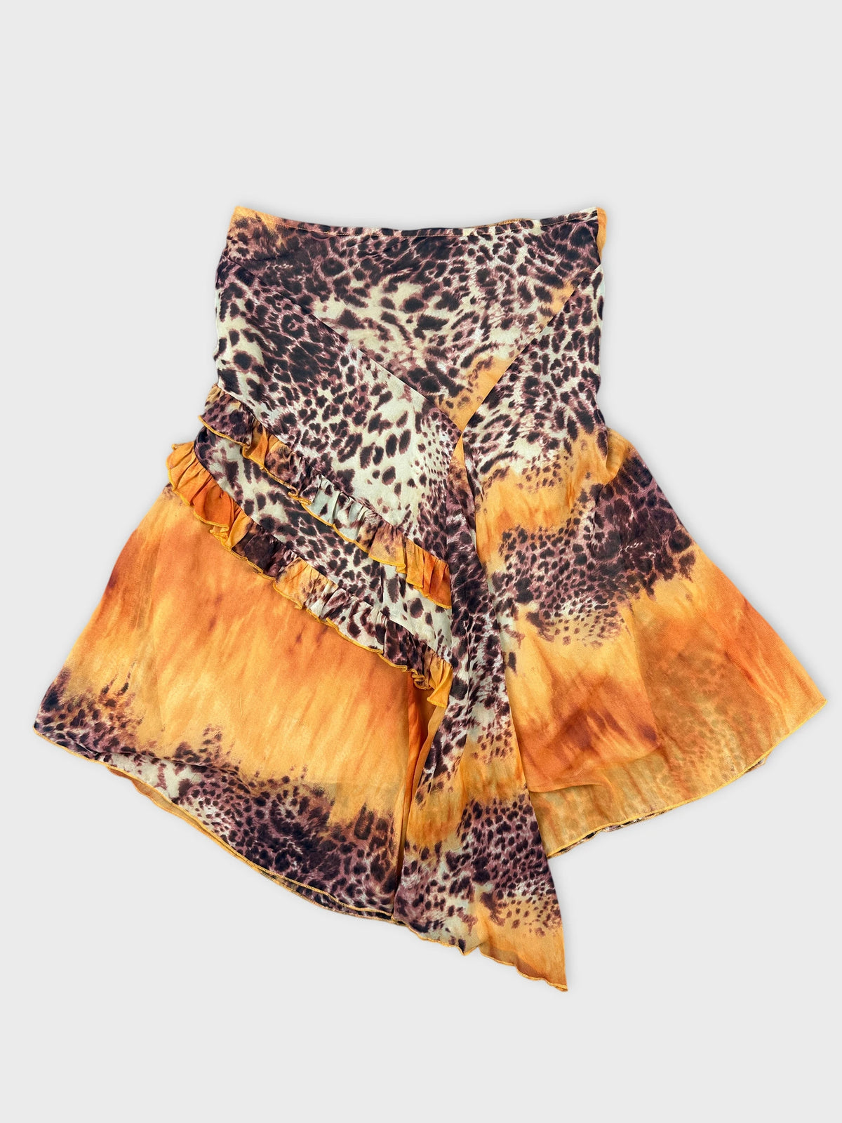 Front view of a leopard print wrap skirt in orange and brown.