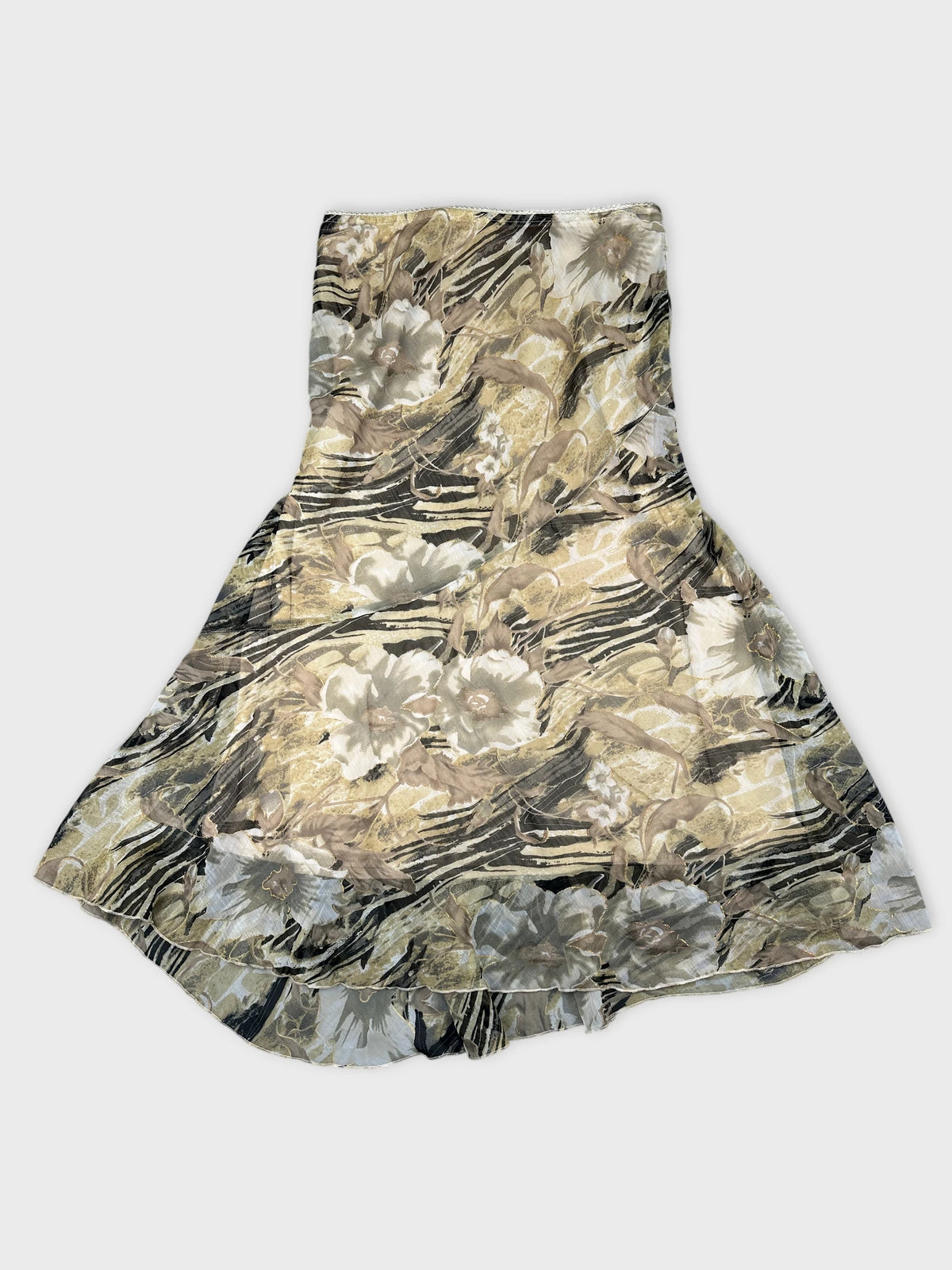 A floral printed skirt in beige and black colors front view.