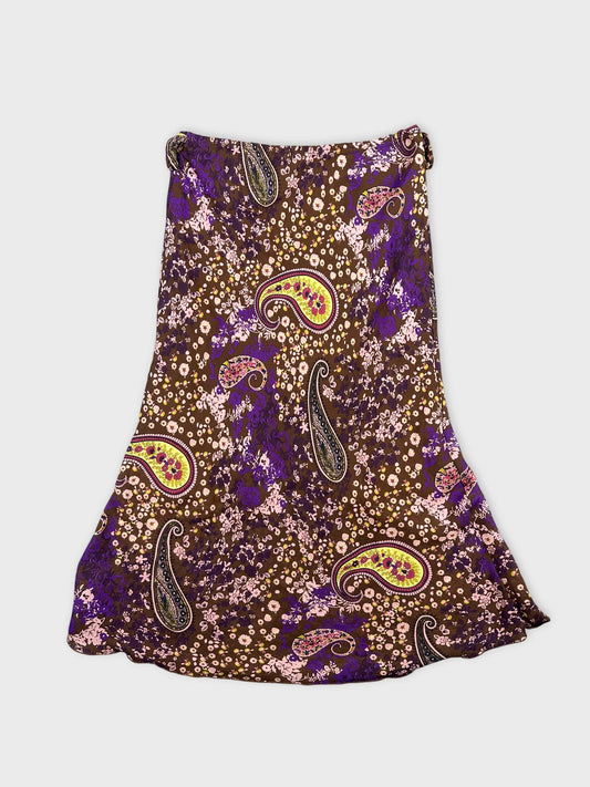 Front view of a brown skirt with paisley and floral pattern.