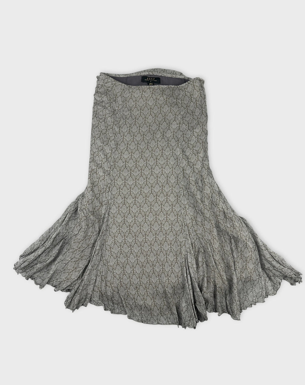 Front view of a vintage skirt in gray with a delicate pattern.