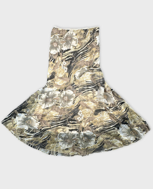Front view of a vintage skirt with floral print in beige and black.