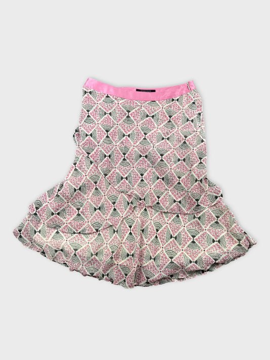 Front view of a skirt featuring a pink and patterned design.