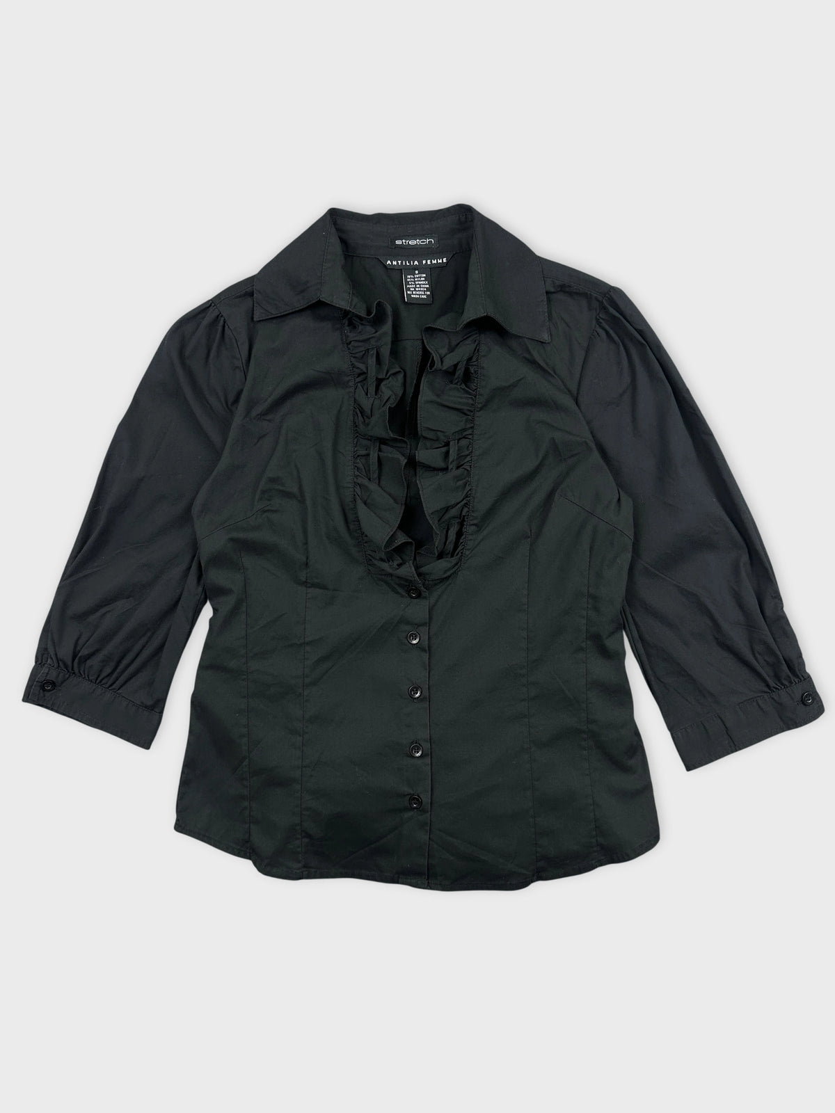 Black bottom up shirt with ruffled front detail front view