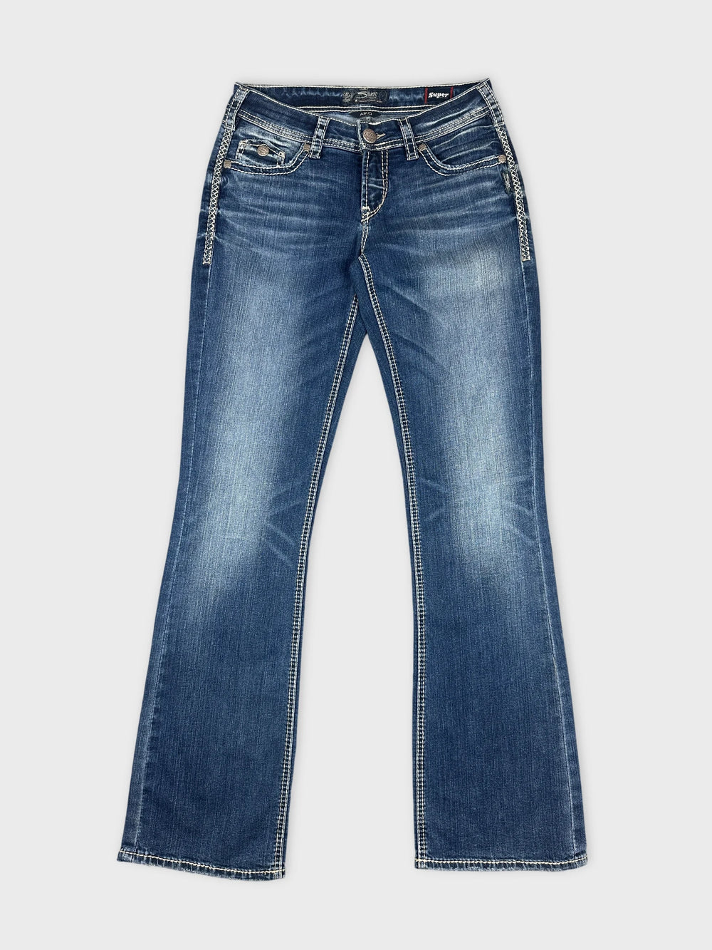 Front view of women denim jeans in dark blue with contrast stitching.