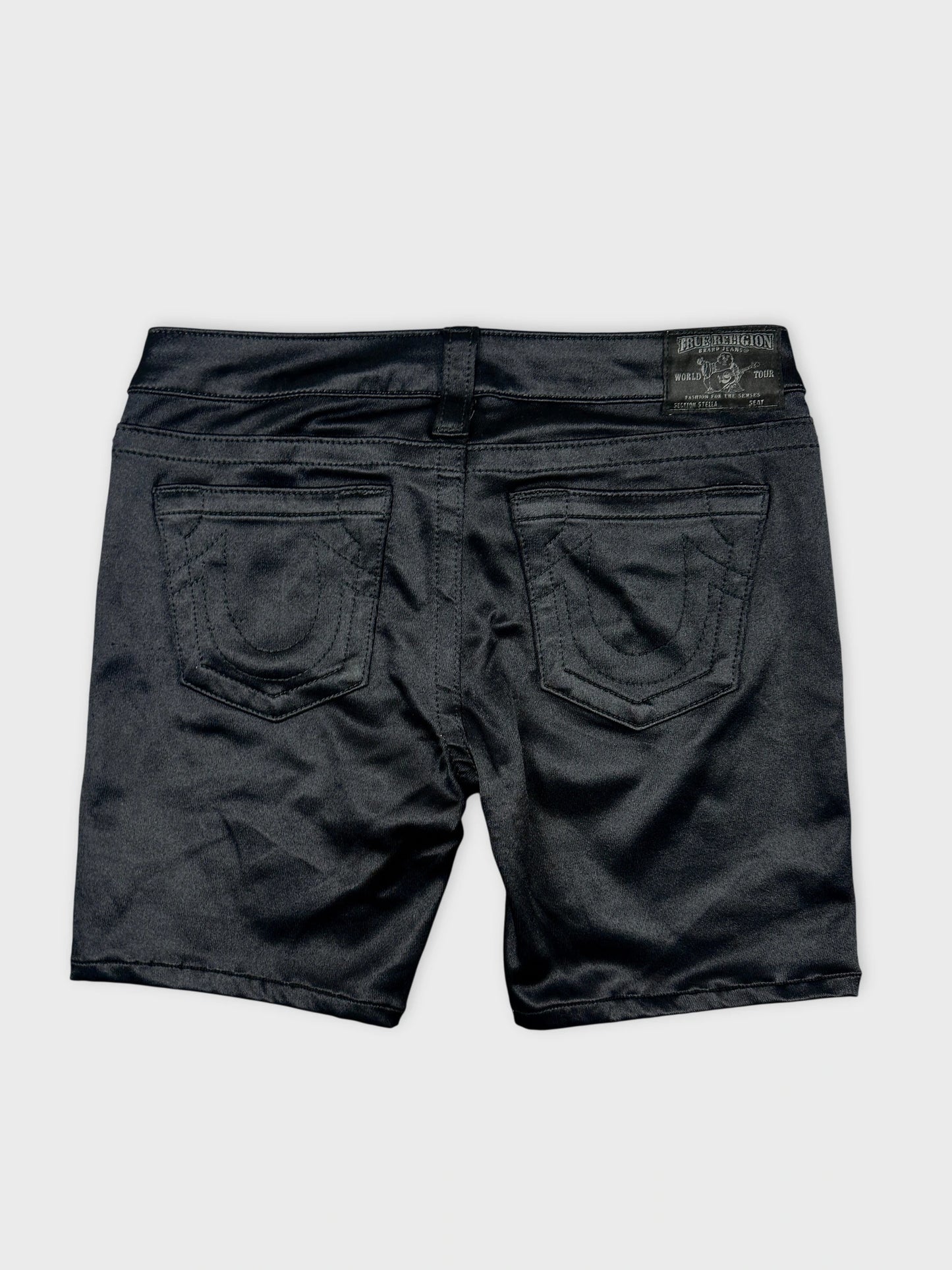 Black denim shorts with detailed back pockets back view