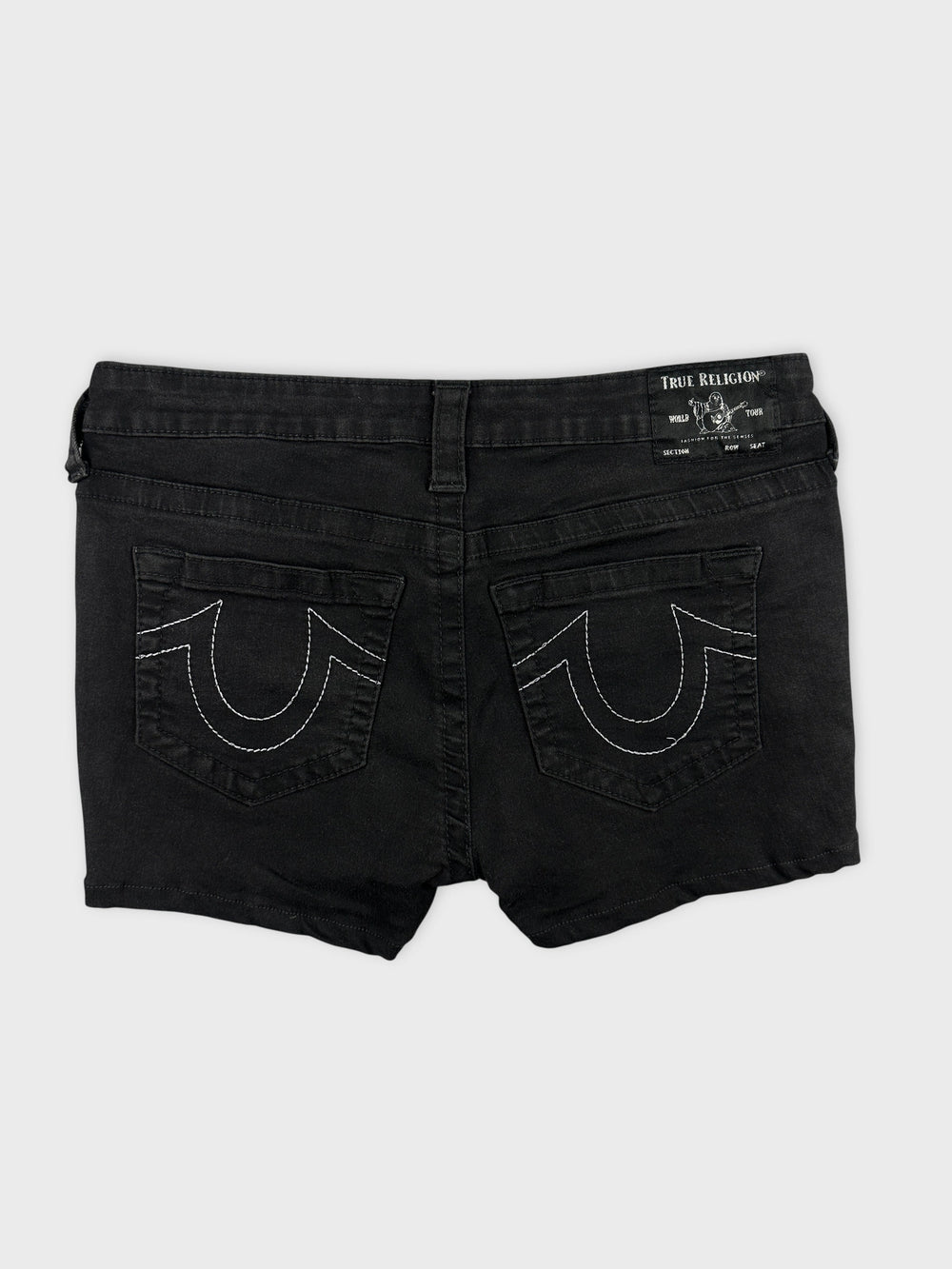 Back view of women denim shorts in black featuring decorative stitching on pockets.