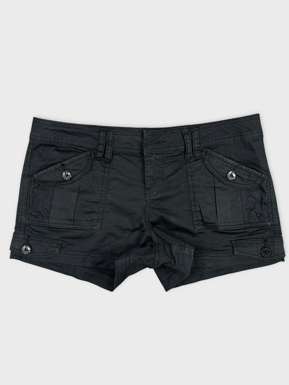 Front view of black denim shorts featuring cargo pockets and button details.