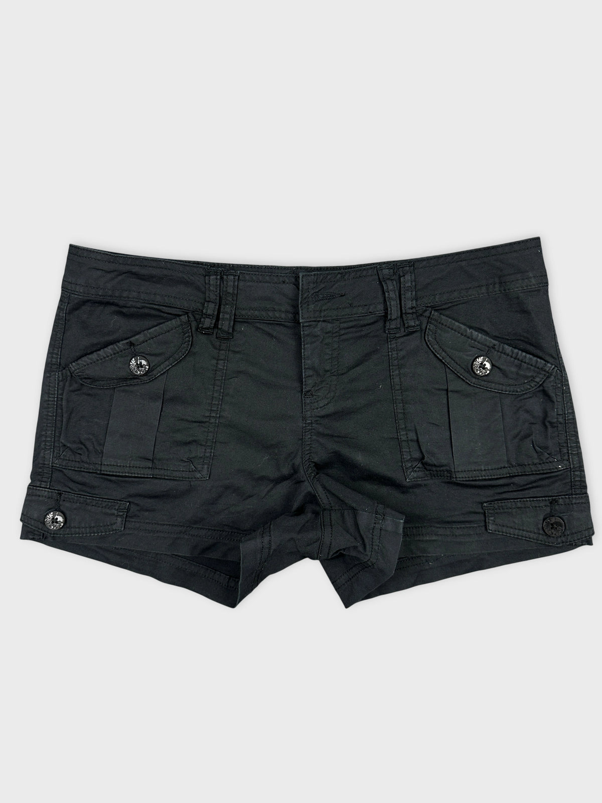 Front view of black denim shorts featuring cargo pockets and button details.
