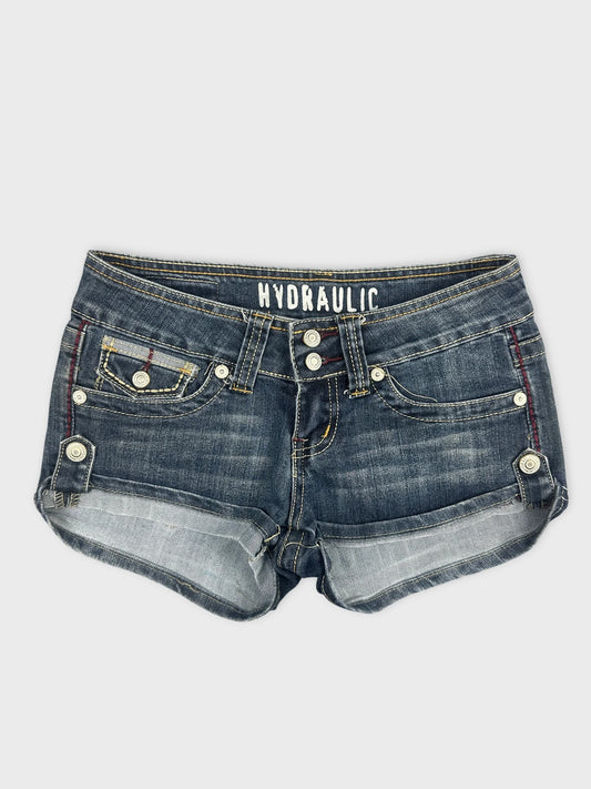 Front view of women's denim shorts in dark blue with button details.
