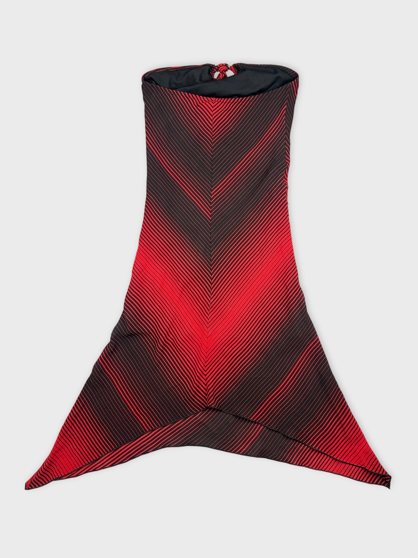 Back view of a long dress in red and black chevron stripes.