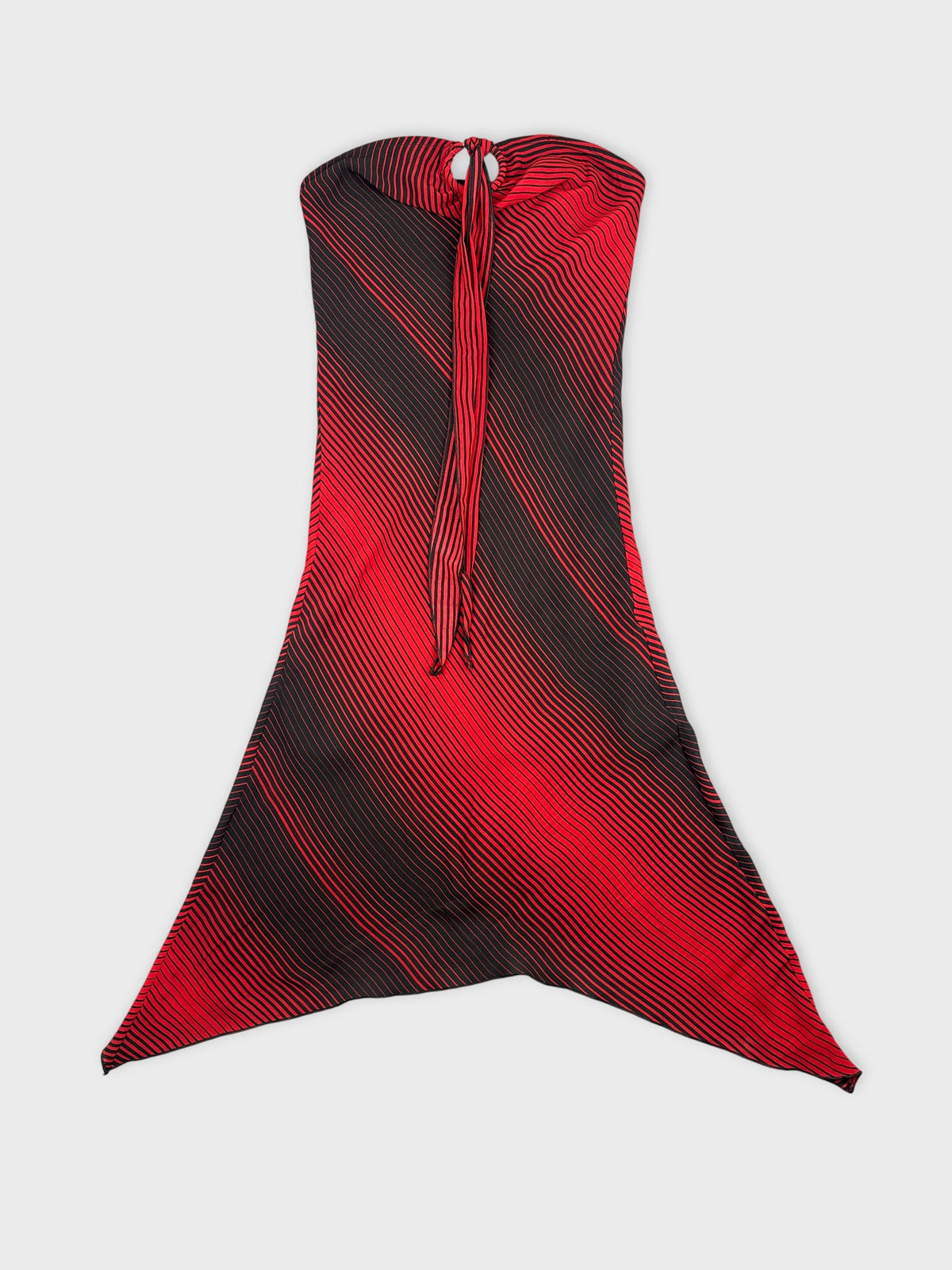 Front view of a long red and black striped dress with a tie detail.