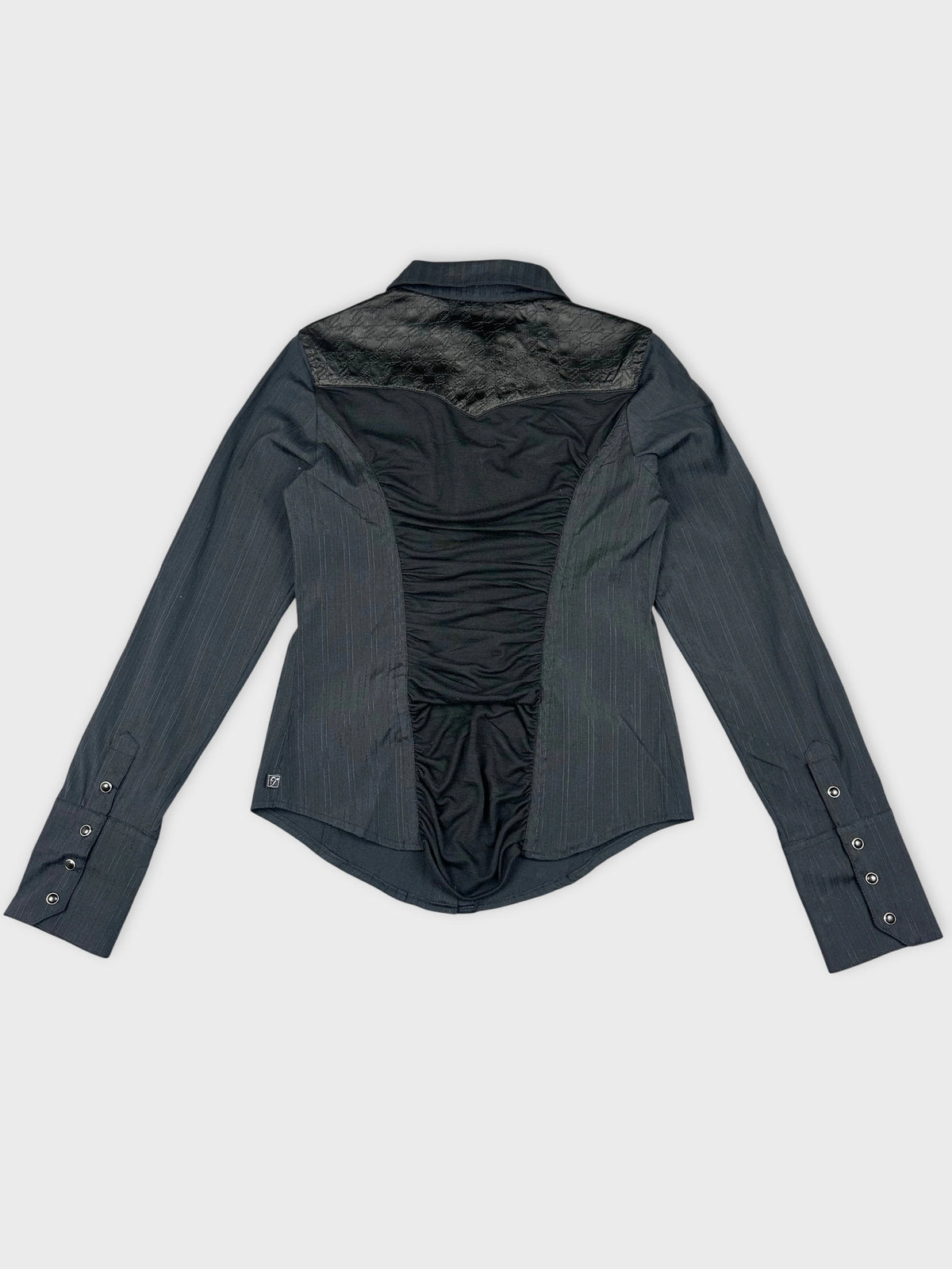 Back view of a black long sleeve button up shirt with ruched detailing.