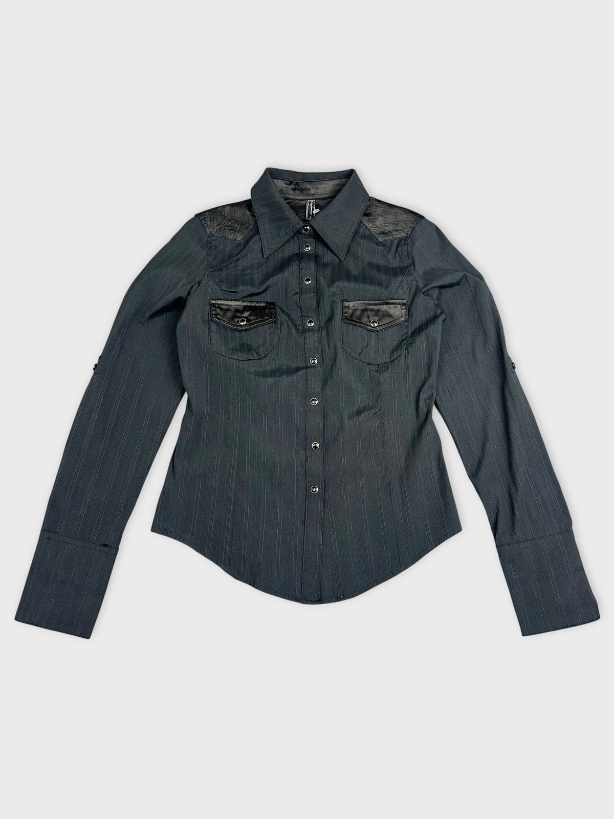 Front view of a dark gray long sleeve button-up shirt with textured shoulder details.