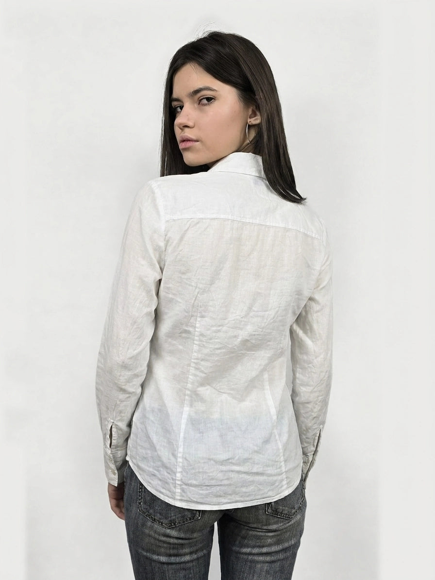Back view of a white long sleeve button up shirt featuring a classic collar.