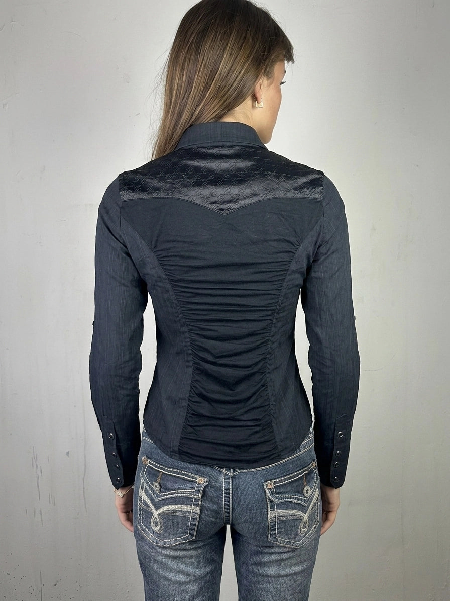 Back view of a black long sleeve button-up shirt with ruched detailing.