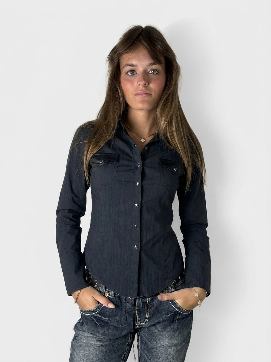 Front view of a navy long sleeve button-up shirt with chest pockets.