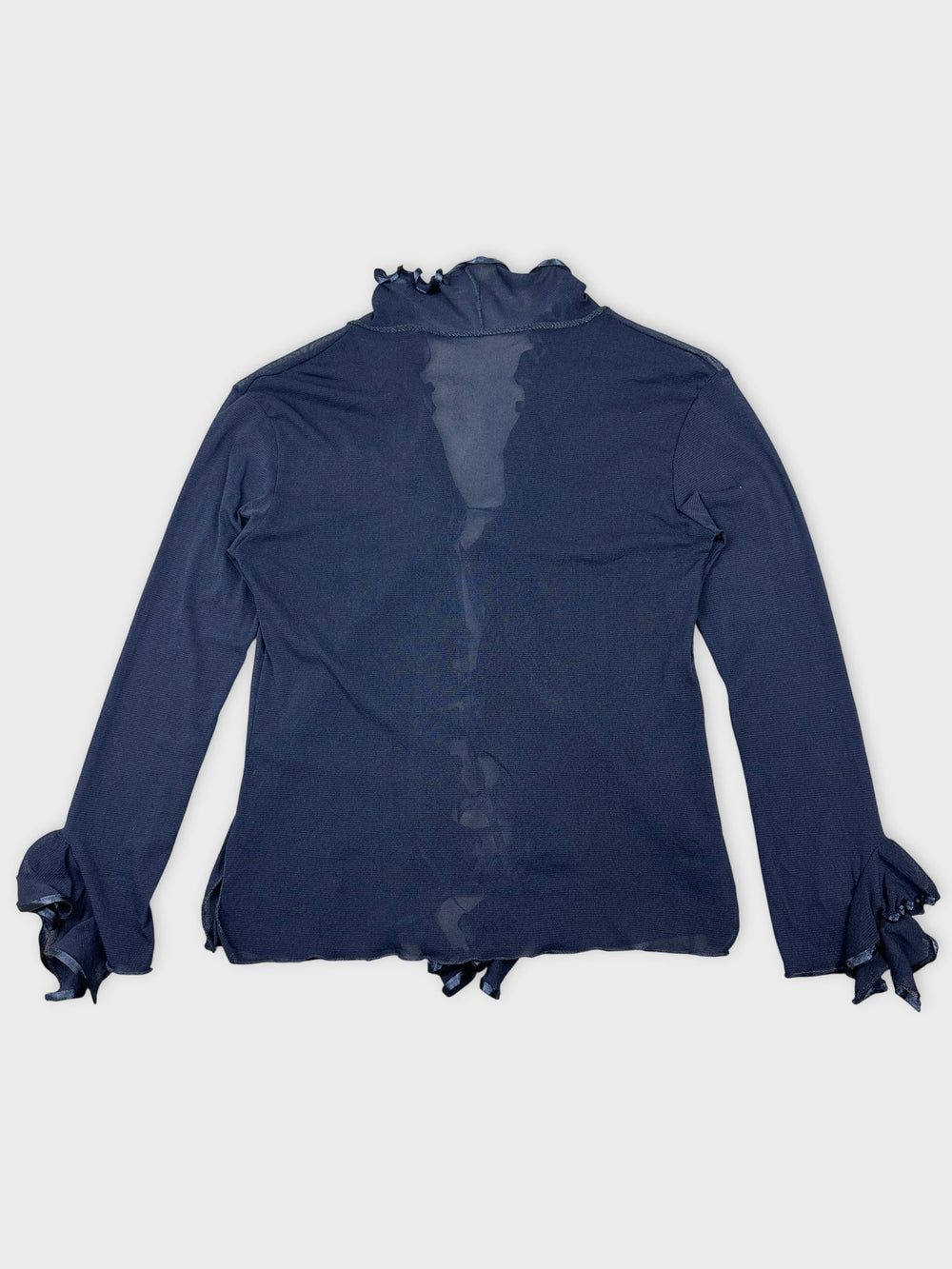 Back view of a long sleeve navy shirt with ruffled cuffs
