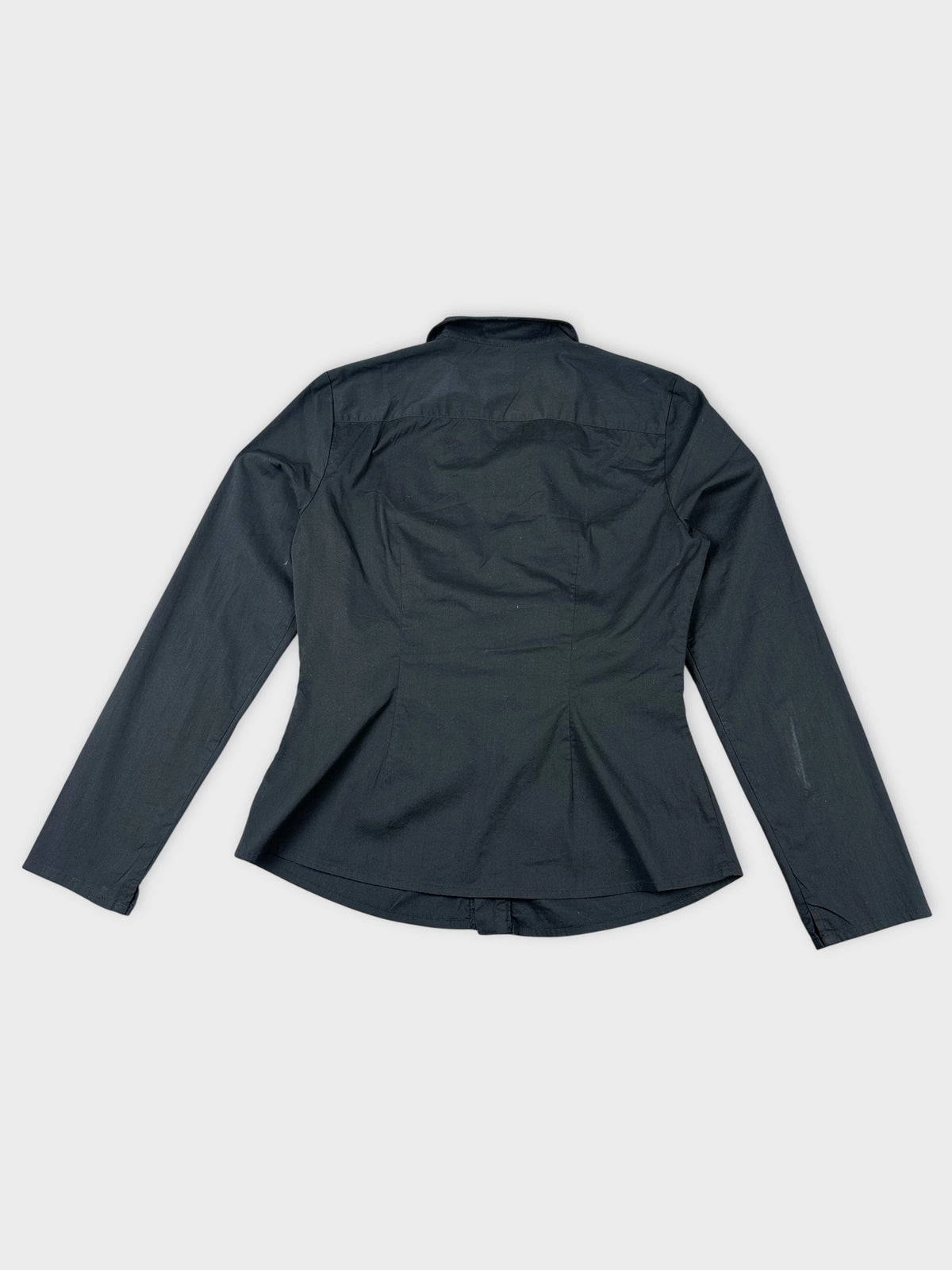 Back view of a black long sleeve shirt with a fitted shape.