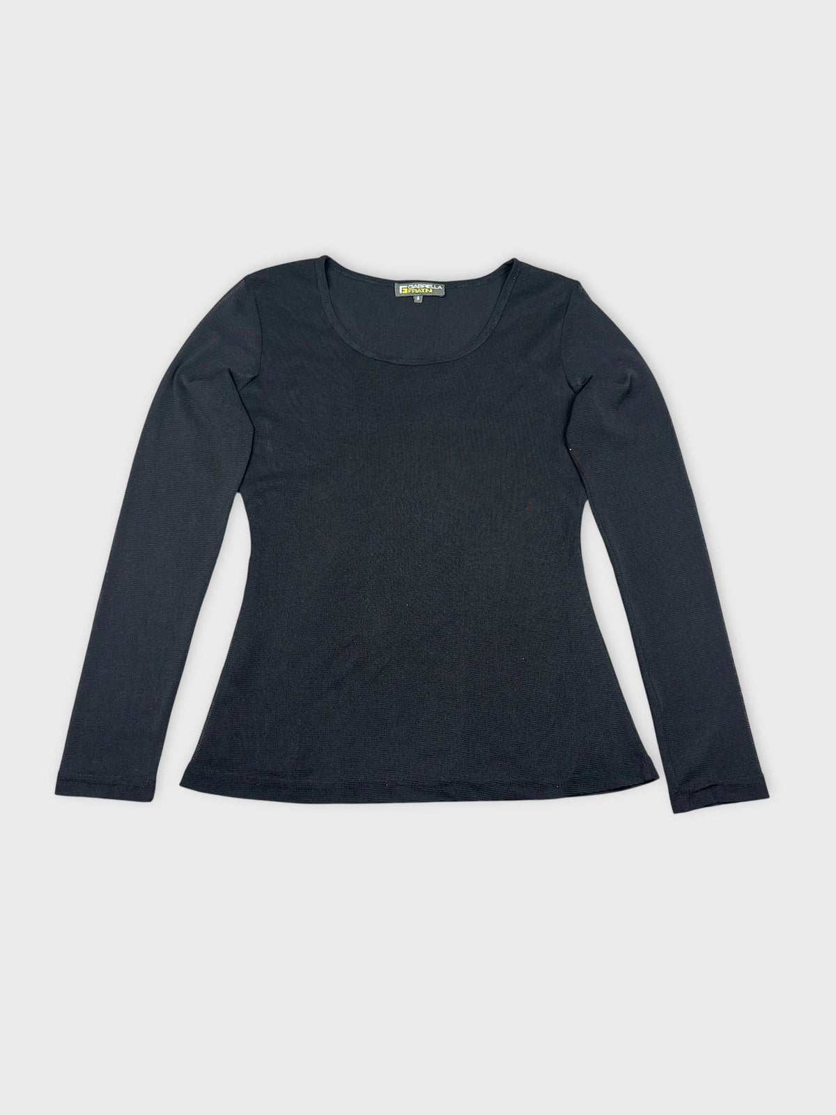 Detail view of a black long sleeve shirt with a scooped neckline.