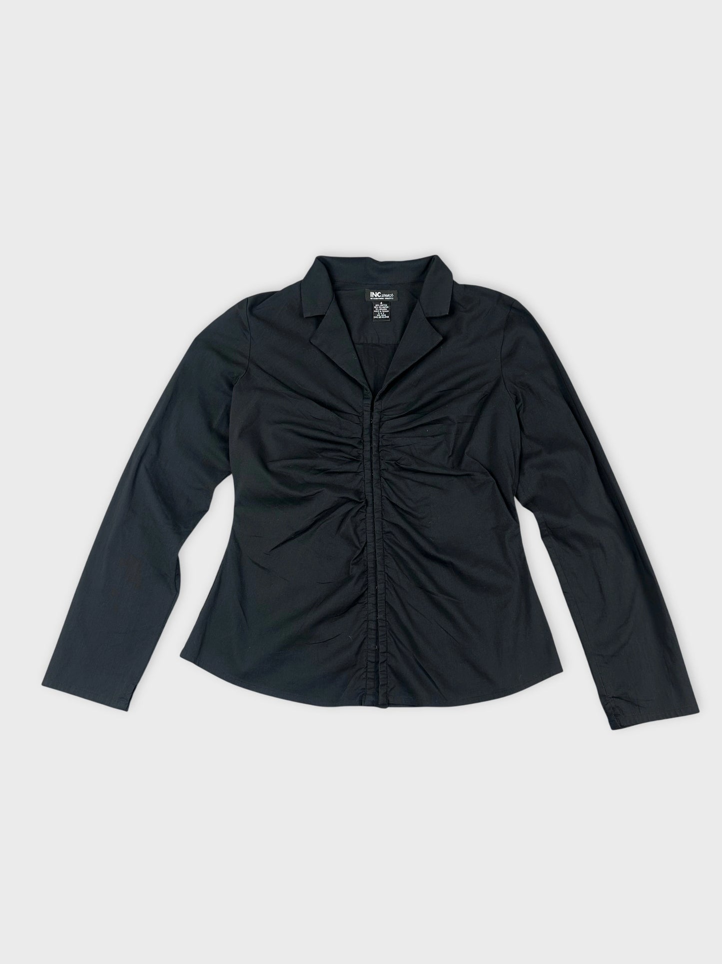Black long sleeve shirt with gathered front detail front view
