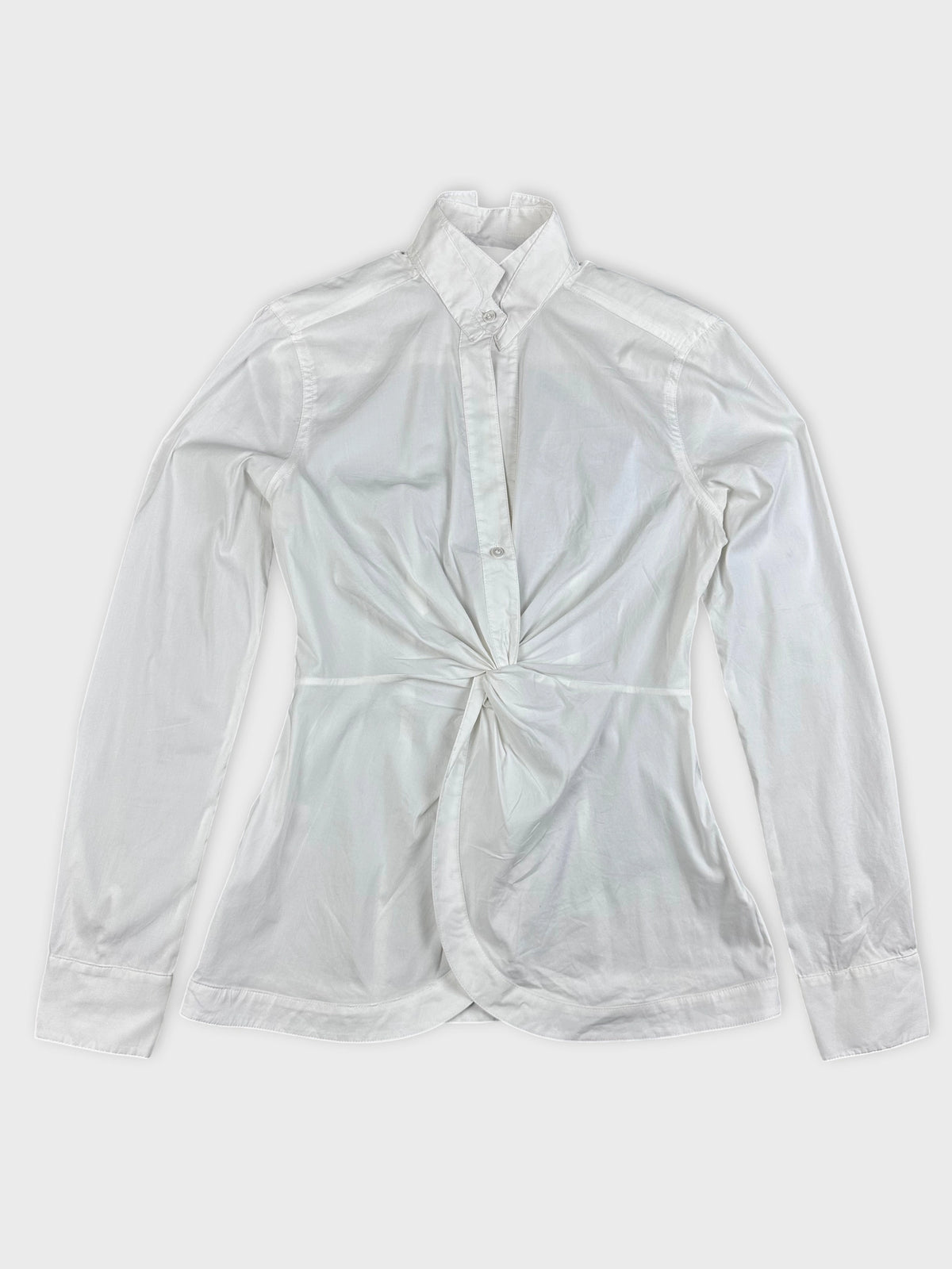 White long sleeve top with a knotted detail front view.