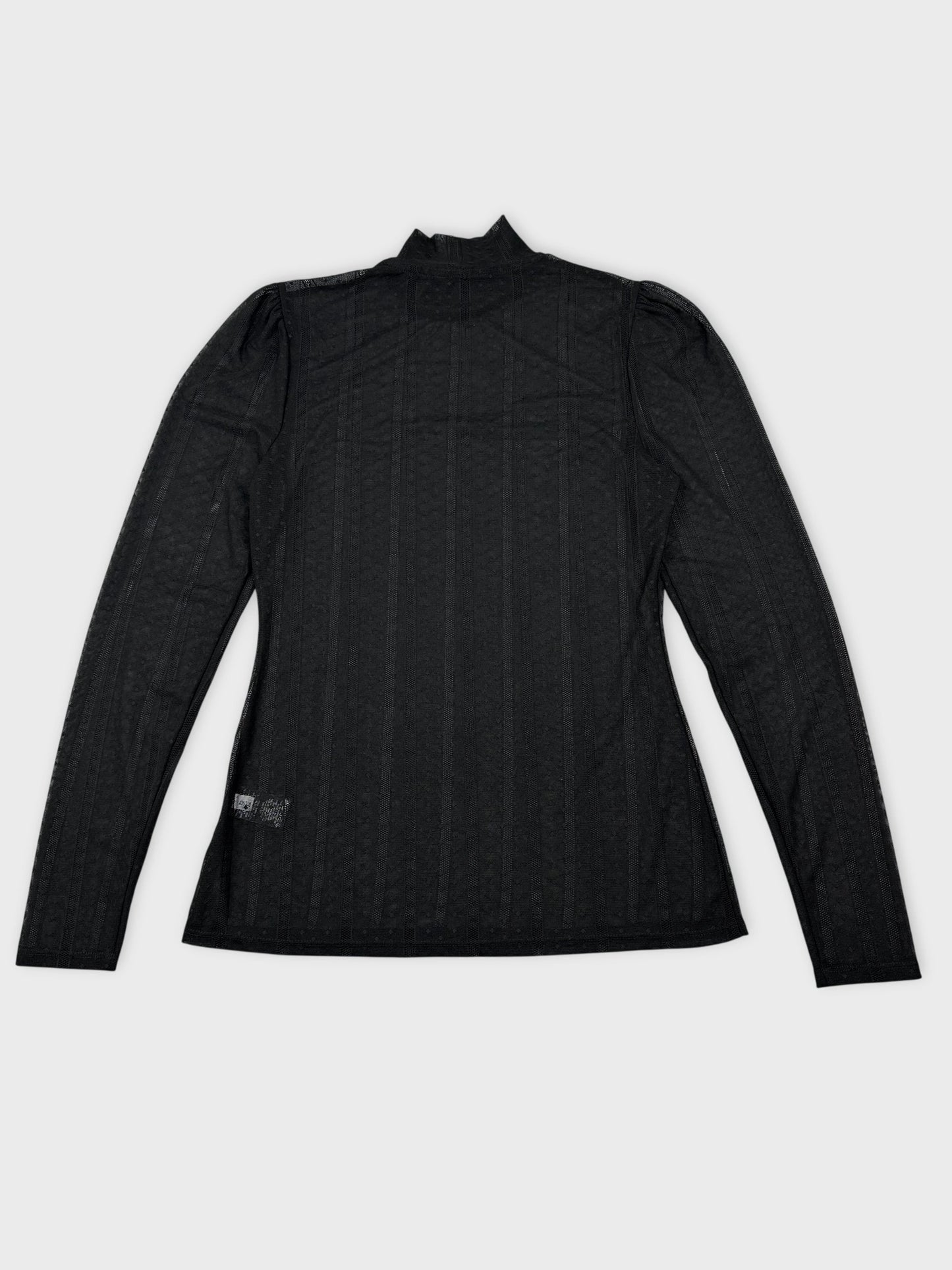 Back view of a black long sleeve top with textured pattern.