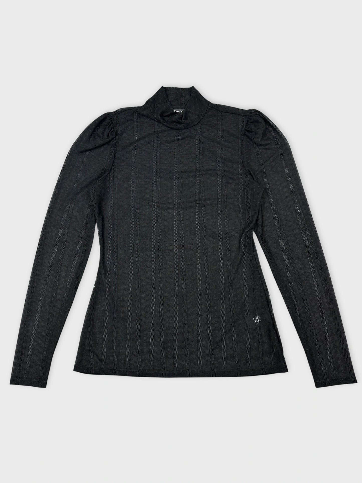 Front view of a long sleeve black top with ribbed texture and high collar.