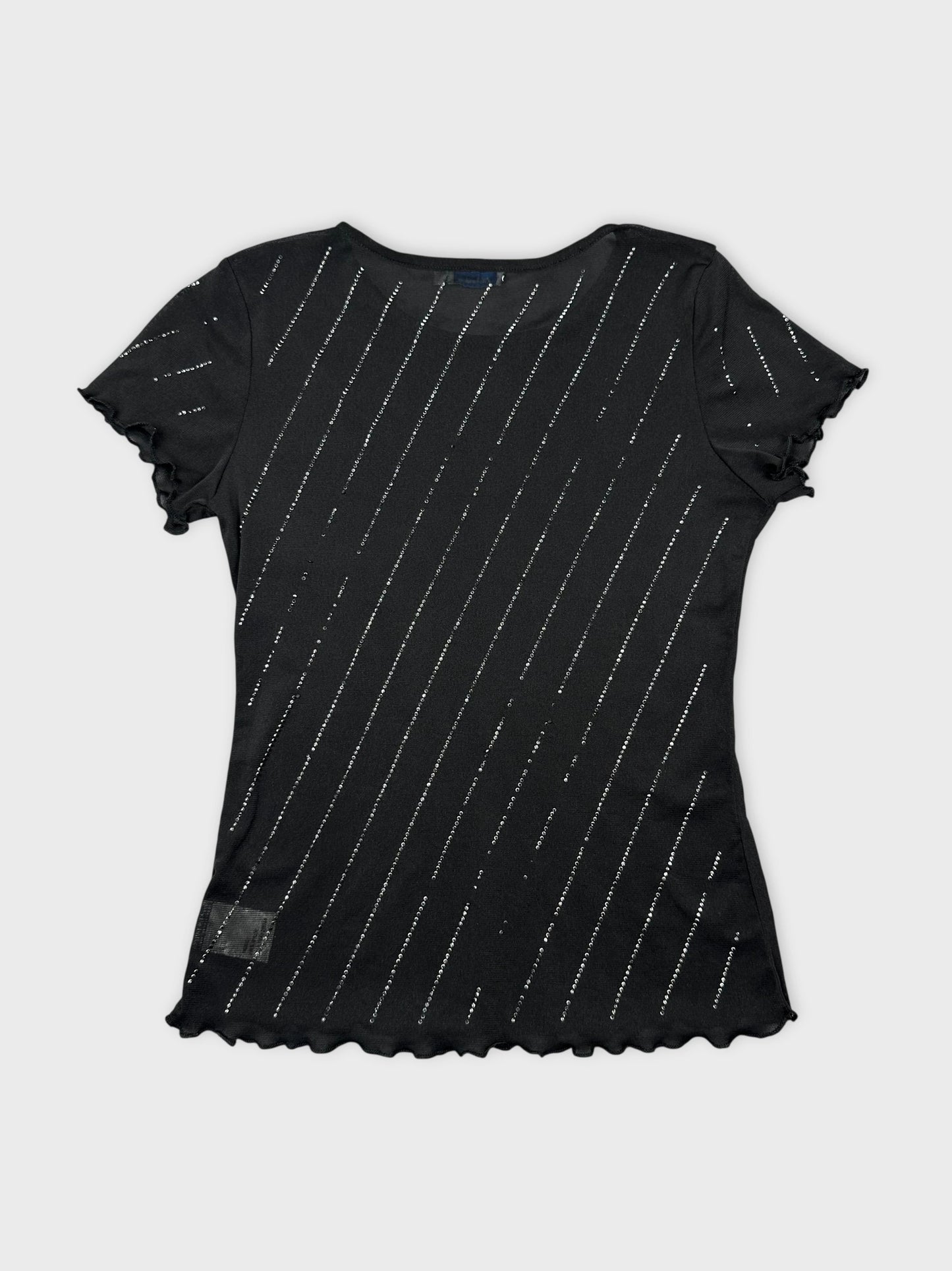 Back view of black short sleeve top with silver diagonal stripes