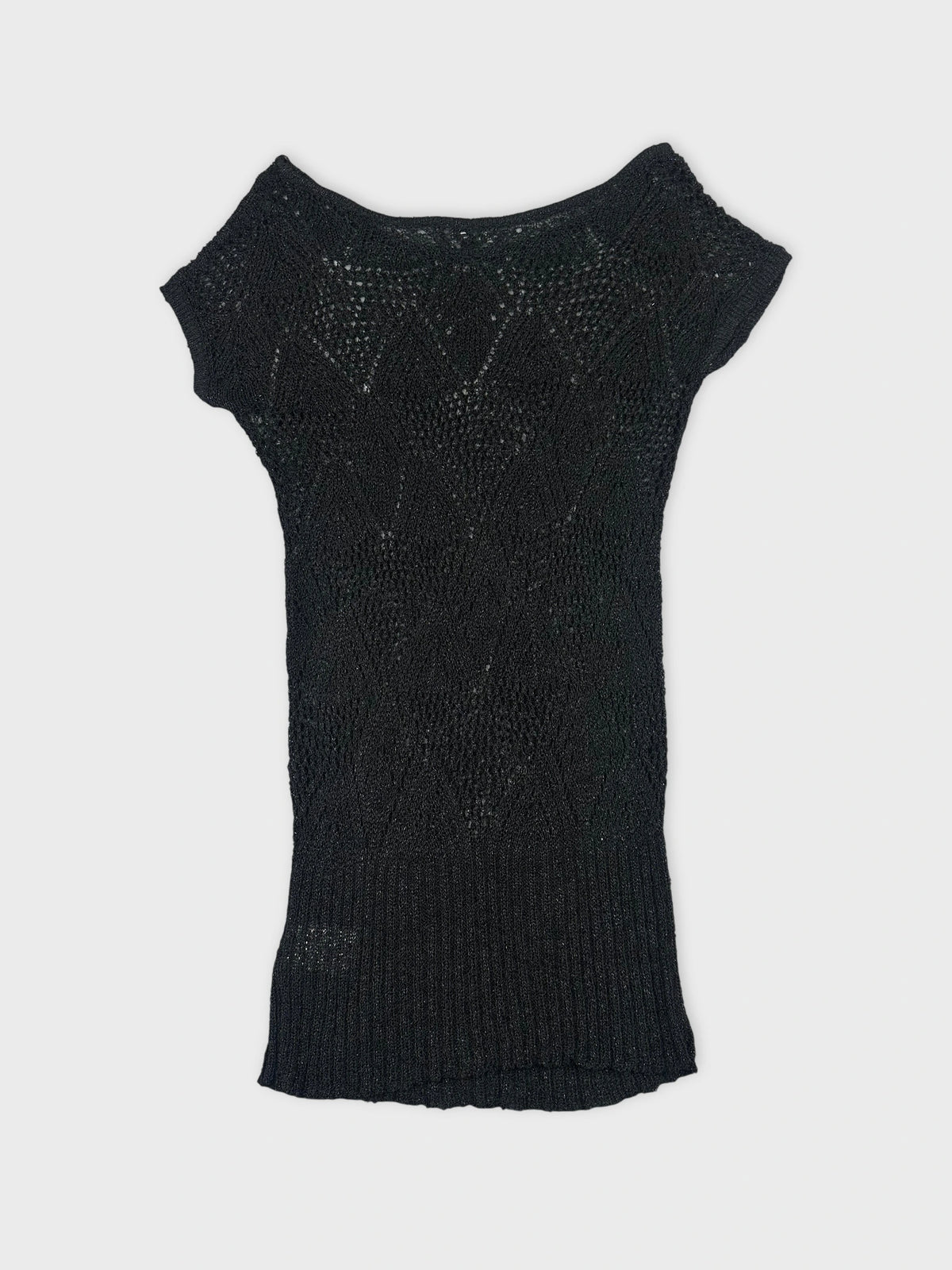 Back view of a black short sleeve top with a textured pattern.