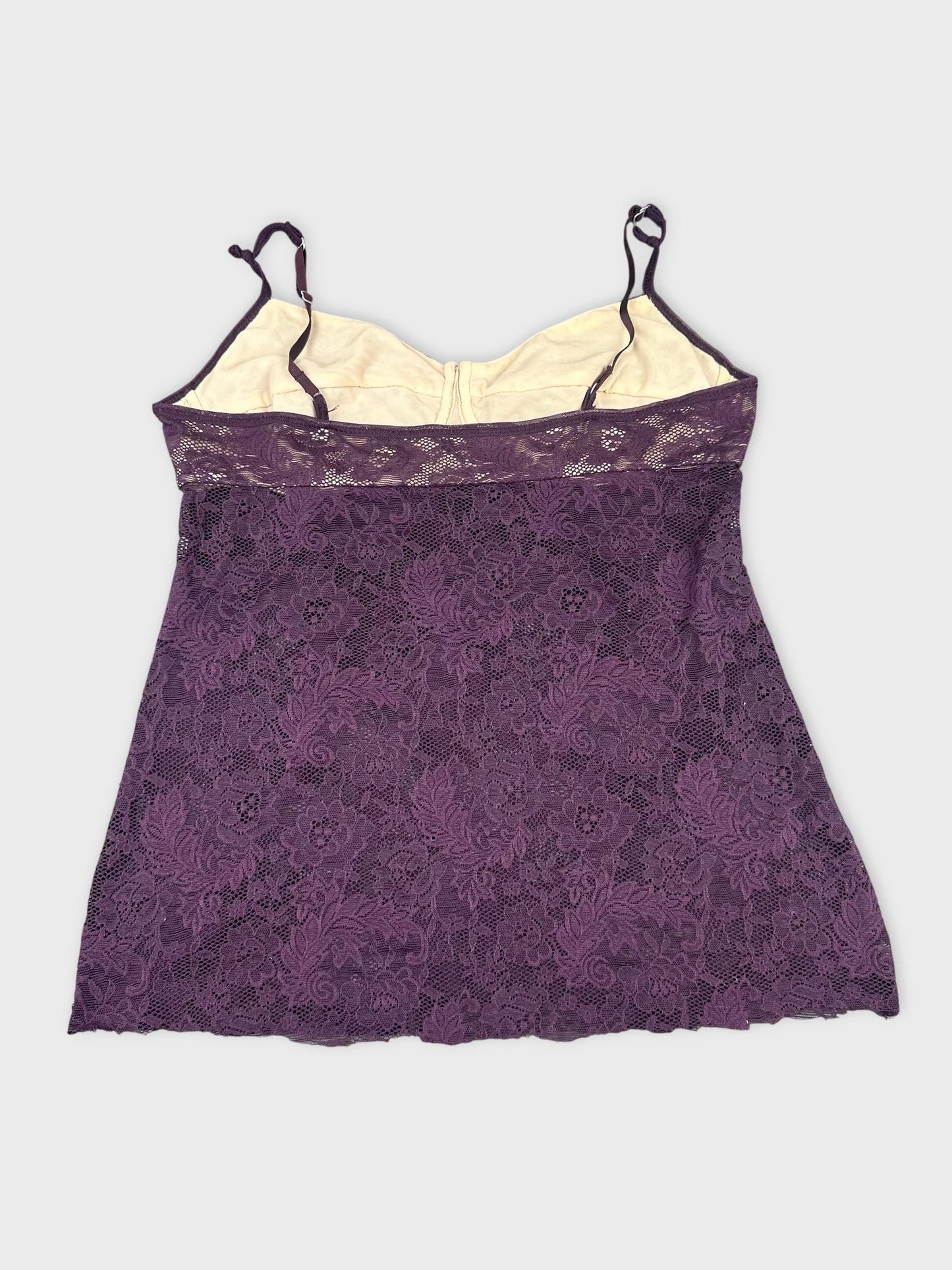Back view of a purple lace camisole with adjustable straps.