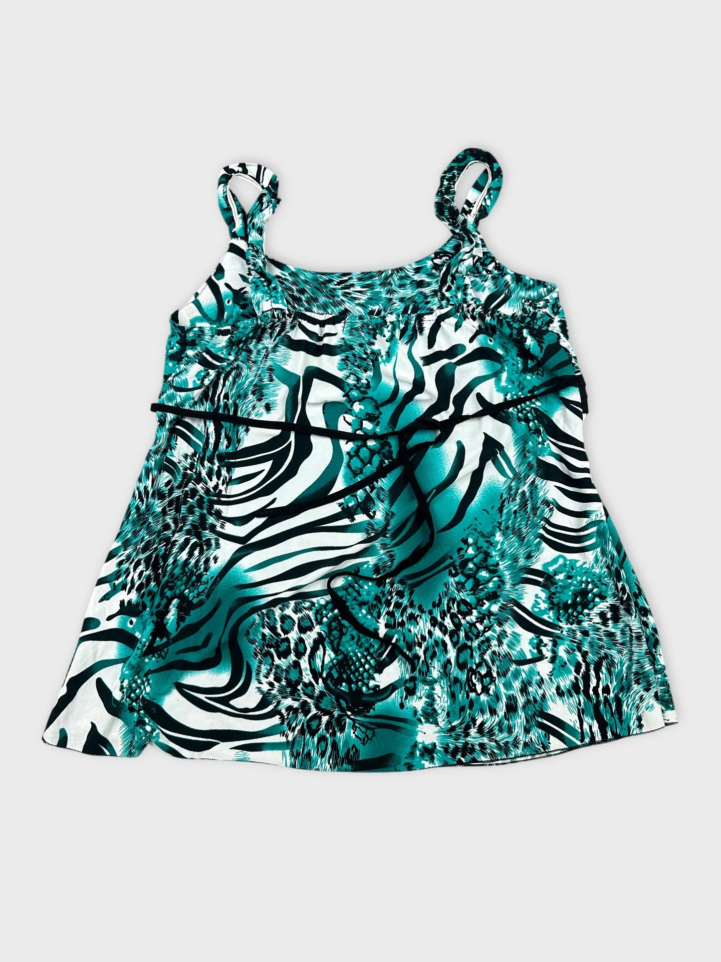 Back view of a teal patterned women's top with spaghetti straps.