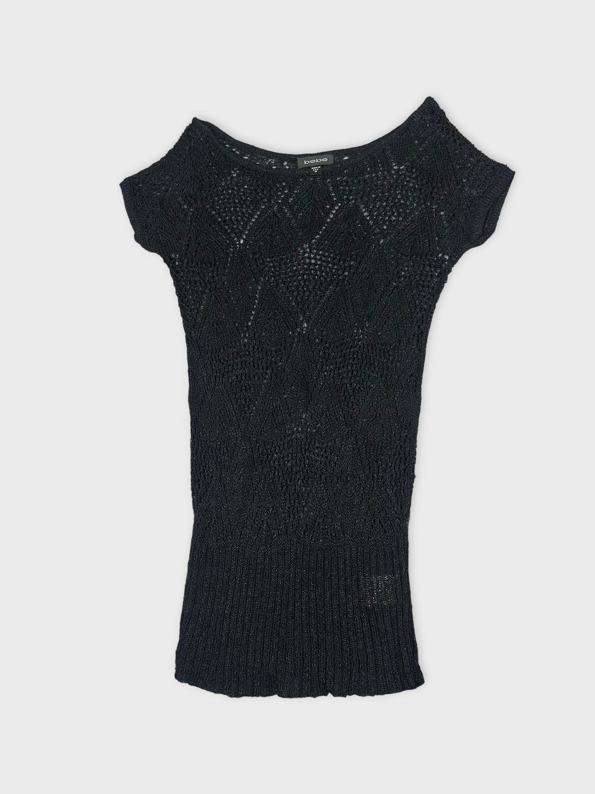 Black short sleeve top with diamond knit detail view.