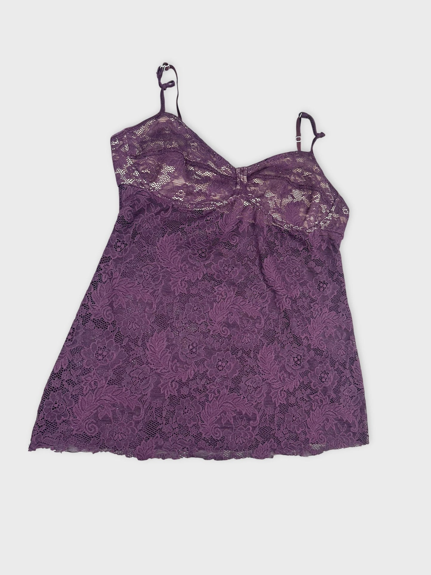 Detail view of a purple lace camisole with adjustable straps.