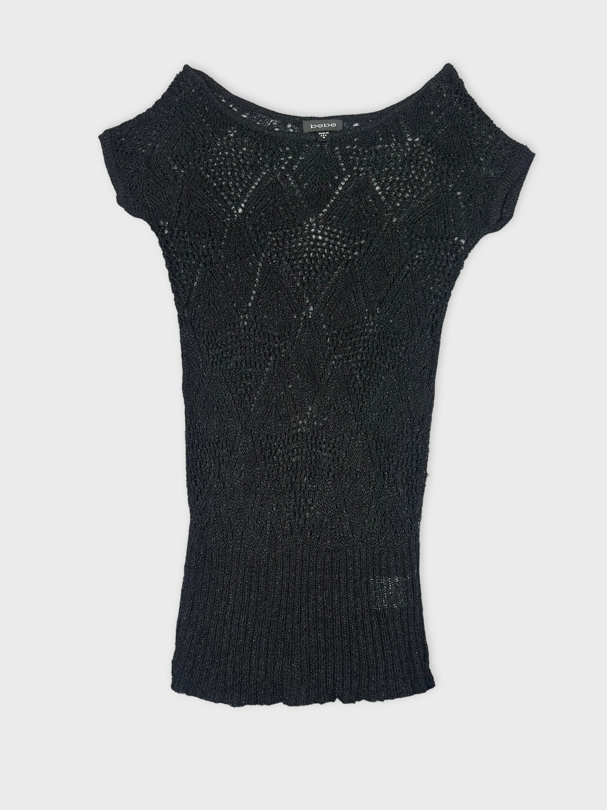 Black short sleeve top with textured diamond pattern front view