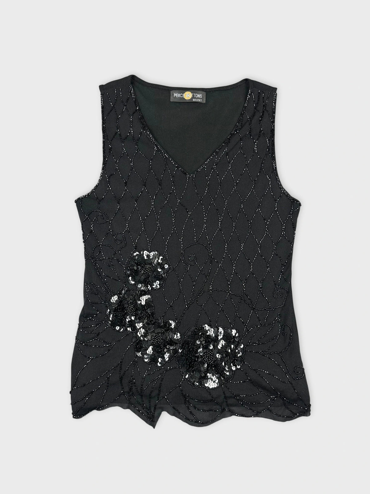 Black sleeveless top with floral sequined detail front view
