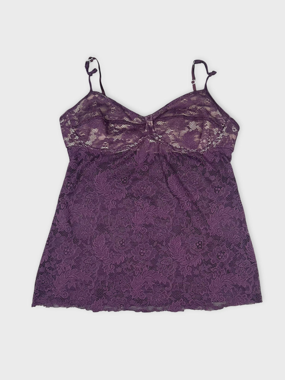 Front view of a purple lace camisole with floral pattern.